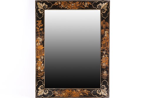 Lot 150 - An early 20th-century wall mirror, decorated...
