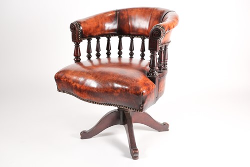 Lot 82 - An early 20th-century tan hide upholstered...