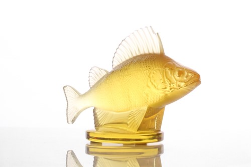 Lot 420 - A Lalique yellow frosted glass perch car...