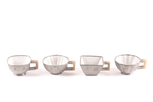 Lot 303 - Four Chinese inscribed pewter, Yixing and jade...