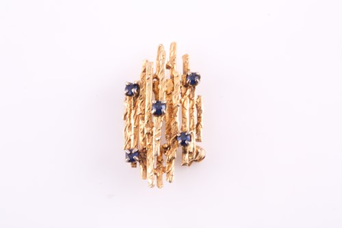 Lot 295 - A five stone sapphire brooch, of naturalistic...