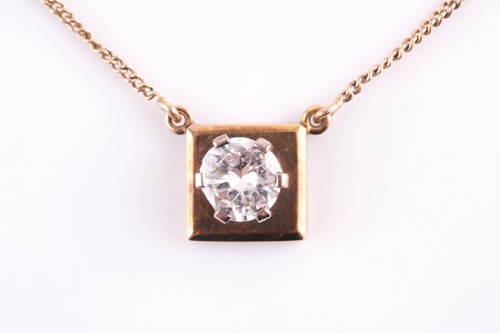 Lot 100 - A single stone diamond pendant, the round...