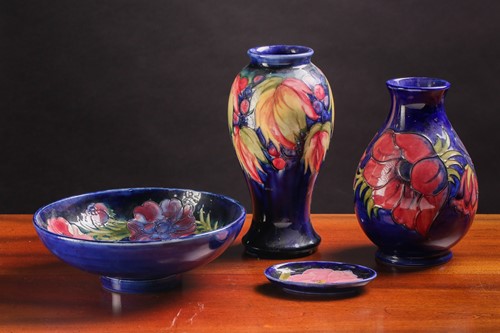 Lot 137 - A Walter Moorcroft baluster vase in the leaf...