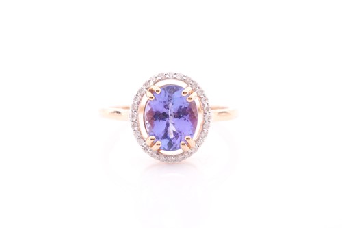 Lot 225 - A 14ct yellow gold, tanzanite, and diamond...