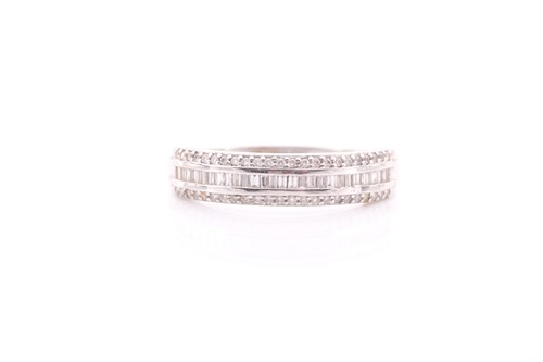 Lot 302 - A platinum and diamond half eternity band,...