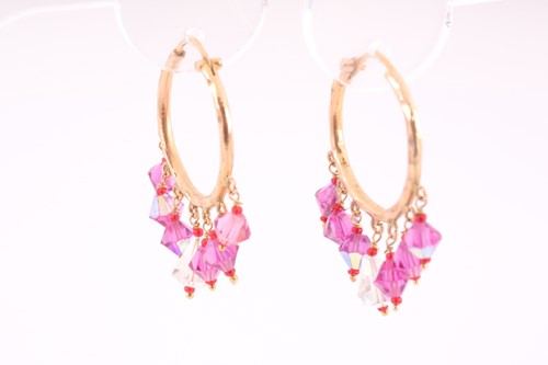Lot 226 - A pair of yellow metal and paste gemstone hoop...