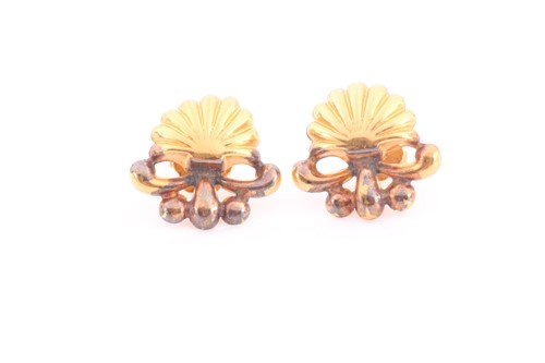 Lot 219 - A pair of yellow metal earrings, of shell...