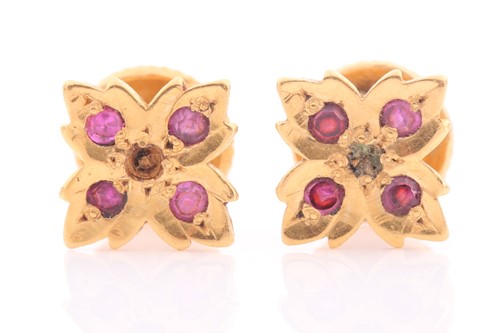 Lot 129 - A pair of yellow metal and red paste stone...