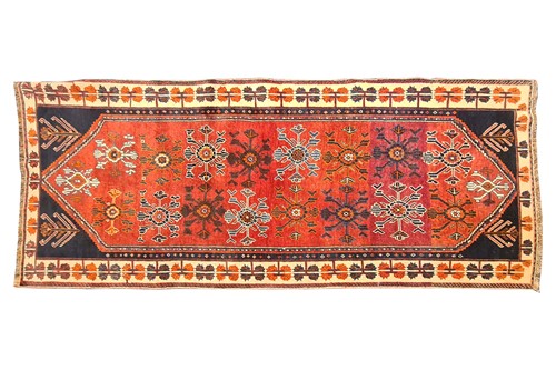 Lot 117 - A 20th-century tomato red ground Qashqai rug...