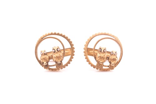 Lot 29 - A pair of American owl cufflinks; depicted as...