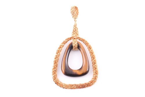 Lot 273 - A vintage tiger's eye and gold pendant circa...