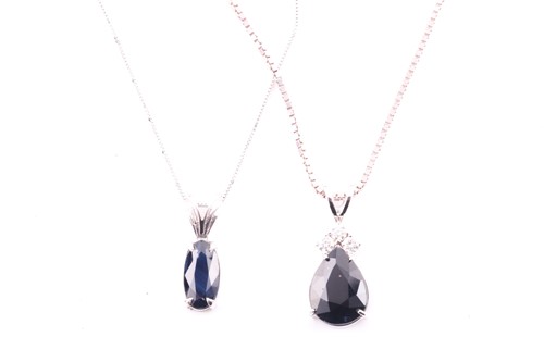 Lot 90 - A white metal and sapphire pendant set with a...