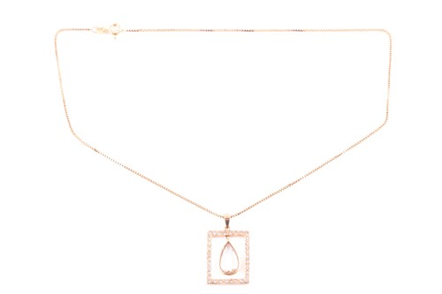 Lot 20 - A citrine and diamond pendant; the pear shaped...