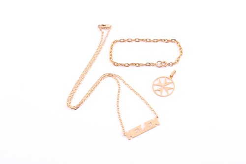 Lot 309 - A 14k yellow gold Helen pendant on flat-link...