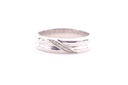 Lot 90 - A 9 carat white gold and diamond ring; the...