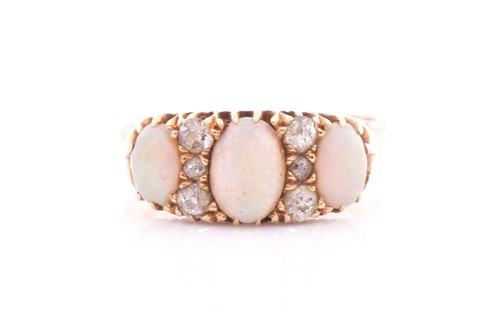 Lot 8 - An Edwardian opal and diamond ring; the three...
