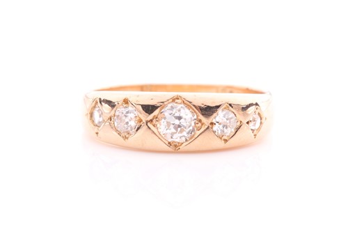 Lot 126 - A five-stone ring; set with four graduated,...