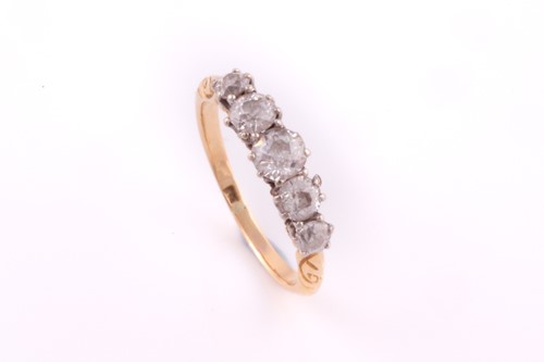 Lot 177 - A five stone half hoop diamond ring; the...