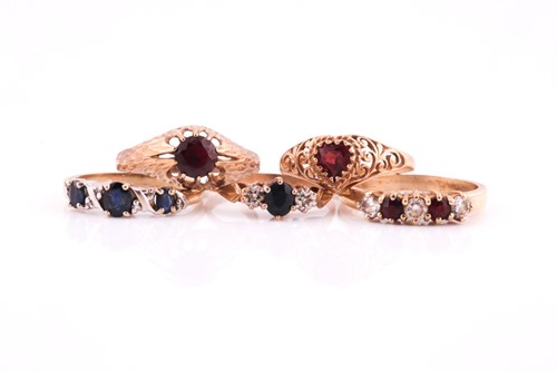 Lot 213 - Five various rings; including a three stone...