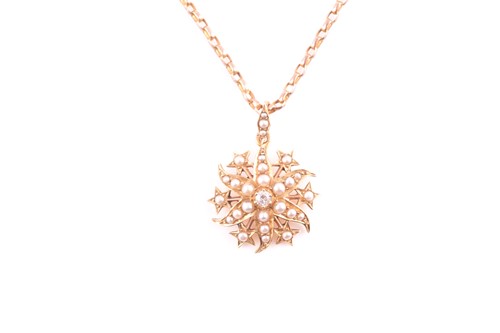 Lot 128 - A Victorian yellow metal and split seed pearl...