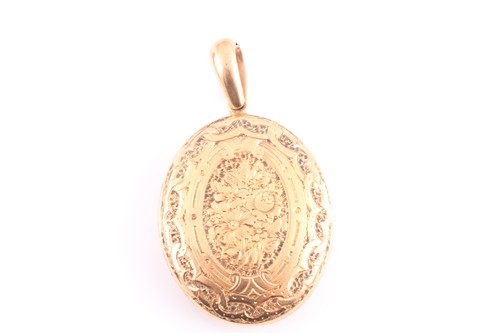 Lot 179 - A Victorian yellow metal locket, the oval case...