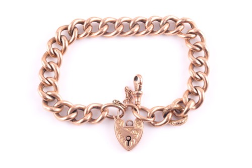 Lot 212 - A 9ct rose gold curb-link bracelet, with...