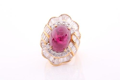 Lot 180 - A yellow metal, diamond, and ruby cocktail...