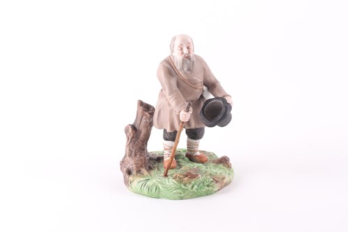 Lot 154 - A Russian Gardner porcelain figure of a blind...