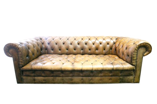 Lot 86 - A Victorian-style deep buttoned faded and...