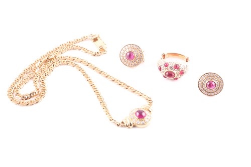 Lot 107 - An 18ct yellow gold, diamond and ruby pendant...