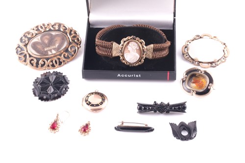 Lot 338 - A Victorian woven hair bracelet, fitted with a...
