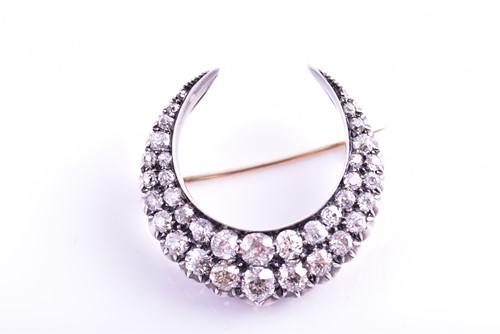 Lot 342 - A Victorian diamond crescent brooch; late 19th...