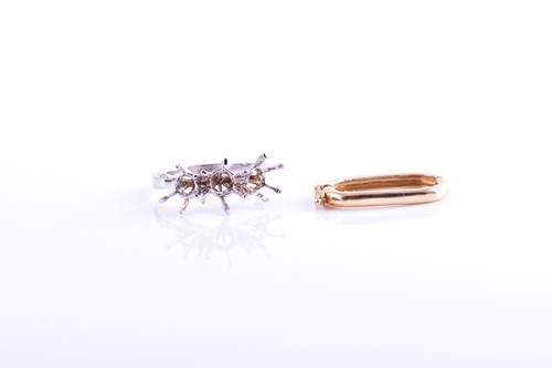 Lot 74 - A white metal ring mount, unmarked, size L 1/2,...