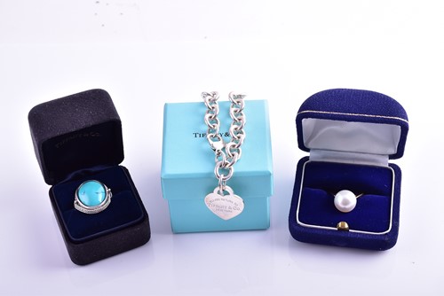 Lot 362 - Tiffany & Co. A silver round-link bracelet,...