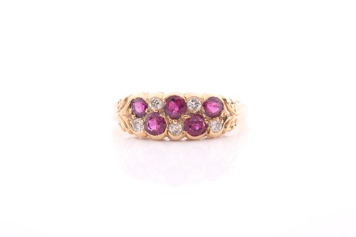 Lot 14 - An 18ct yellow gold, diamond, and ruby ring,...