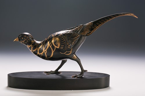 Lot 121 - A patinated bronze pheasant, 20th century, the...