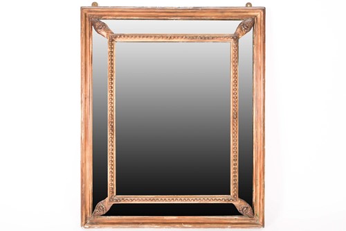 Lot 103 - A 19th-century gilt bevel framed wall mirror...