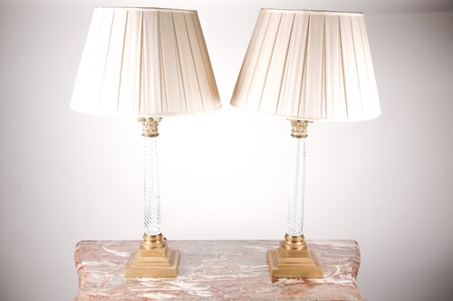 Lot 181 - A pair of 20th-century brass and wrythen clear...