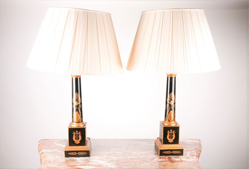 Lot 196 - A pair of black toleware Doric column table...
