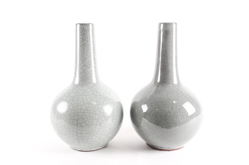 Lot 83 - A pair of Chinese celadon bottle vases, third...