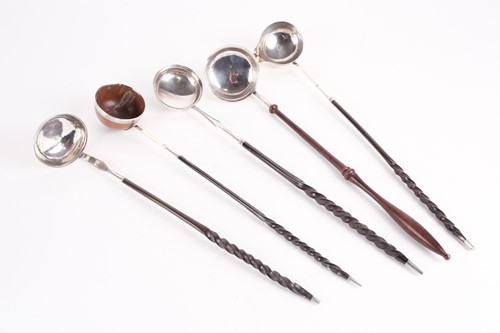 Lot 328 - A collection of five Georgian white metal...
