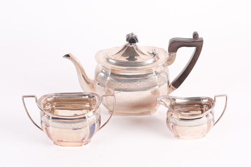 Lot 320 - An Edwardian three-piece silver tea set....