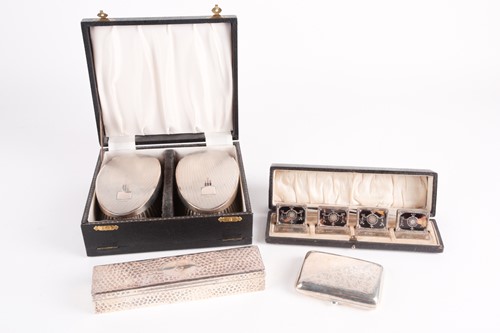 Lot 321 - A presentation cased set of four 1920s silver...