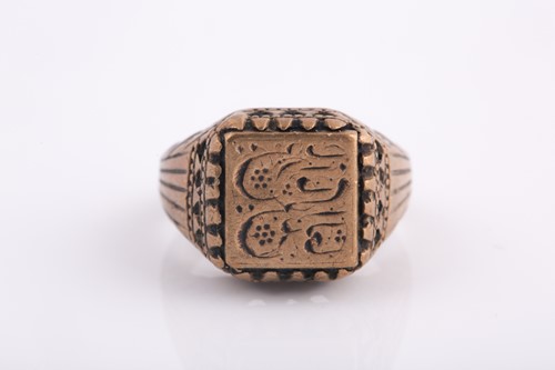 Lot 250 - A base metal Indo Persian gentleman's ring,...