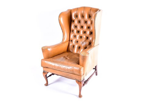 Lot 135 - A Queen Anne style deep buttoned hide...