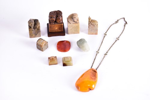 Lot 124 - Three Chinese jade seals, a small jade carving...