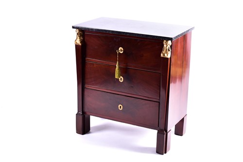 Lot 133 - A French Empire style marble-topped mahogany...