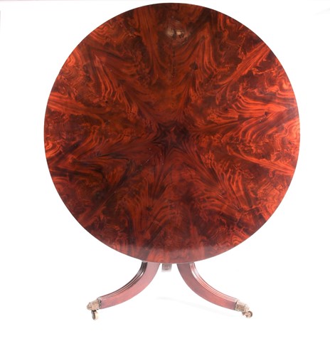 Lot 159 - A William IV flame grain mahogany circular...