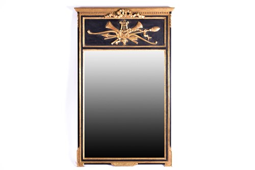 Lot 172 - A French Empire design ebonized trumeau type...