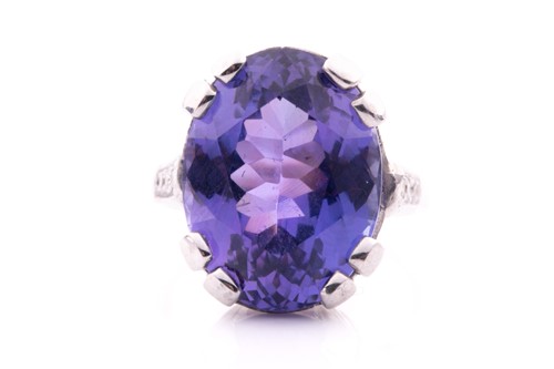 Lot 102 - An 18ct white gold, diamond and tanzanite...